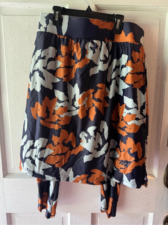 Mod Sportswear Dresses & Skirts - Women’s Navy Floral Print A-Line Skirt with Orange & White Accents